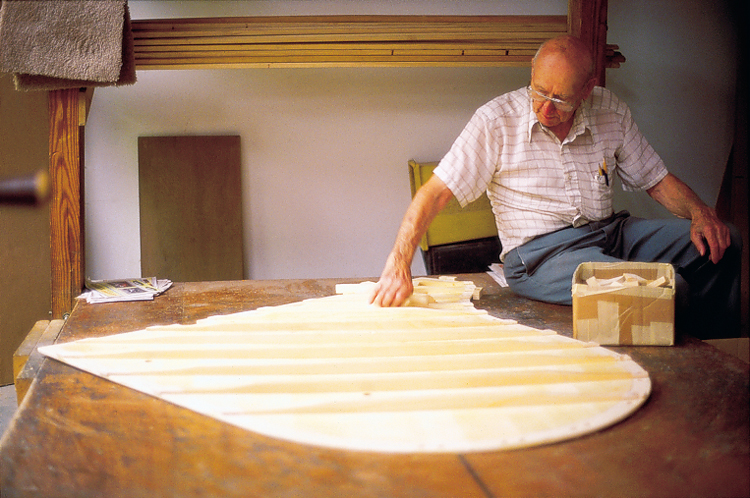 Elmer Cleans Up After Gluing Ribs onto the Soundboard